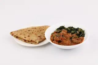 Beef stew with 2 chapatis and a side