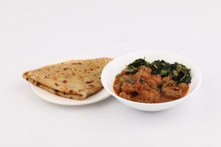Beef stew with 2 chapatis and a side