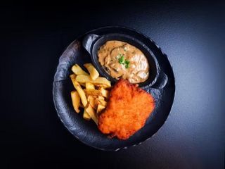 Meniu Schnitzel de pui cu sos de ciuperci