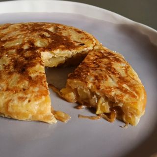 Tortilla patatas rellena kebab (porción)