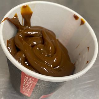 Recipiente con Nutella para churros