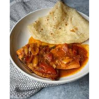 Fish stew + veg served with chapati