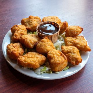 Nuggets de pollo con salsa barbacoa	