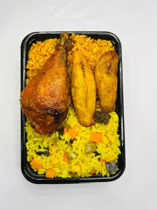 A Plate Of Rice With Chicken