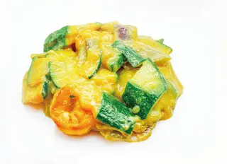 69. Gamberetti* con curry al latte di cocco