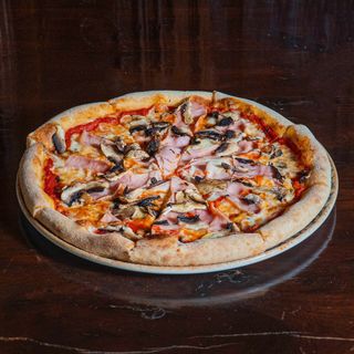 Pizza Prosciutto e funghi