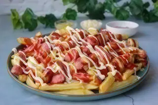 Ración De Salchipapas
