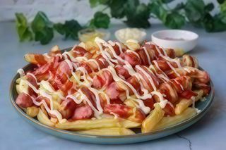 Ración De Salchipapas