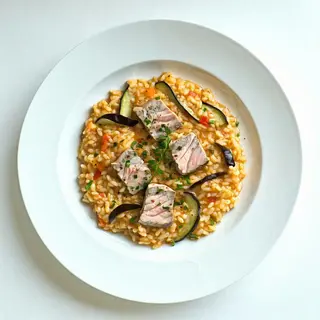 Risotto con pesce spada e melanzane