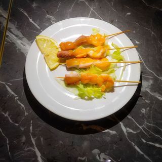 209. Spiedini di pesce misto