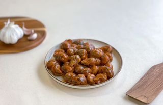 Caracoles con salsa 1 ración