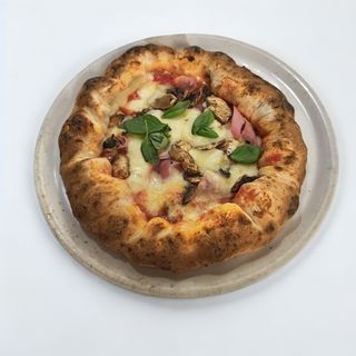 Prosciutto e funghi