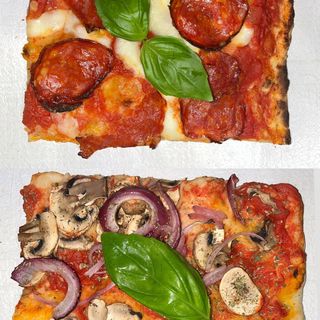 2 Porciones de pizzas