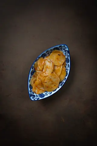 Patate aromatizzate al cumino