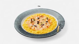 Safron Risotto with wild shrimps carpaccio