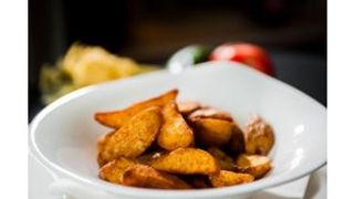 Porcija pečenog krompira