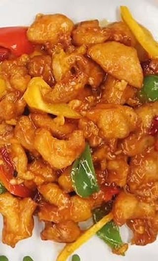 58. Riso saltato con gamberi, prosciutto, piselli, bambù e pollo