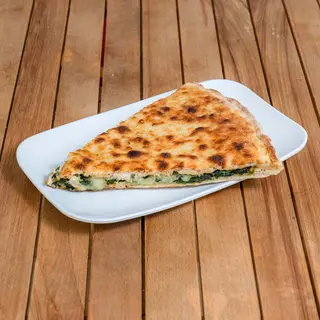 Spicchio focaccia spinaci e formaggio