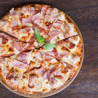 Pizza Jambon + canette Gratuite 