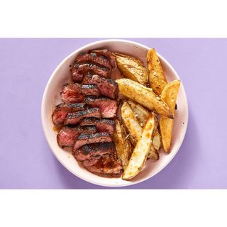  Beef Wet Fry with potato wedges and kachumbari