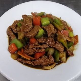 36 Ternera con salsa de ostra