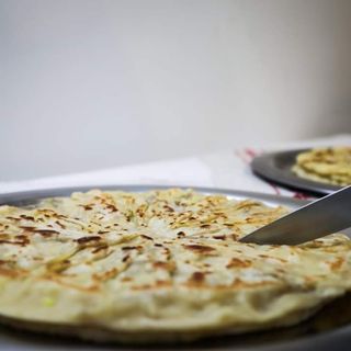 Placinta  creață cu branza dulce si stafide