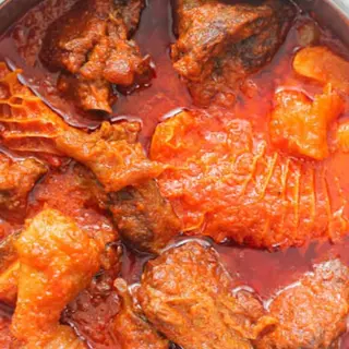 Naija crowded stew. (Shaki, beef, cowleg, goatmeat and a piece of chicken)