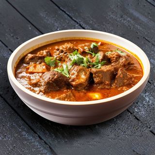 Mutton Curry Com arroz ou naan.