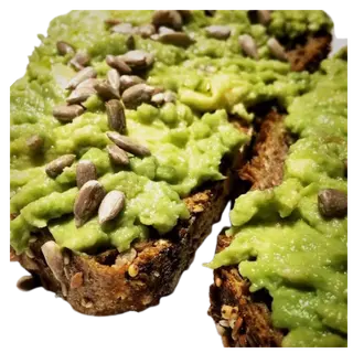 Tostada con aguacate, tomate y semillas