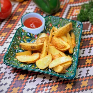 Картофельные дольки  с чесноком