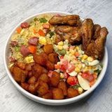 Fried rice ,fried plantain ,salad and chicken wings 