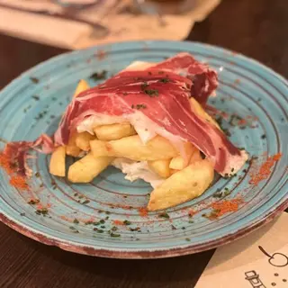 Tapa De Huevos Estrellados Con Jamón Ibérico