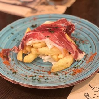 Tapa De Huevos Estrellados Con Jamón Ibérico