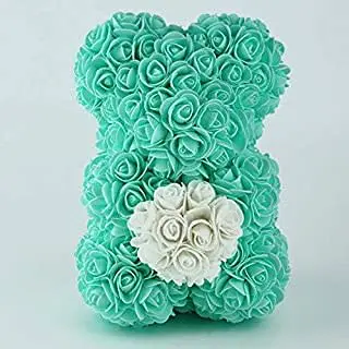 Orso con fiori finti e cuore turchese 