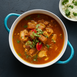 Carne de Porco Dhansak com Grão