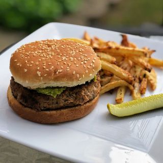 Chicken Burger served with Chips, Coleslaw and Soda 350ml