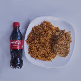 Deluxe meal (Jollof rice, plantain, chicken & pet drink)
