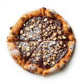 Pizza nutella con granella di nocciola e zucchero a velo