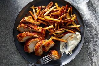 Pan fried boneless Chicken Breast And Chips 