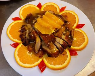 Pato Asado Con Salsa De Naranja