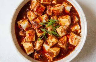 Kimchi saltato con straccetti di pancetta e doufu