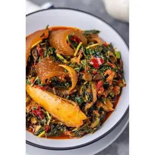 Poundo yam + vegetable + Goat meat
