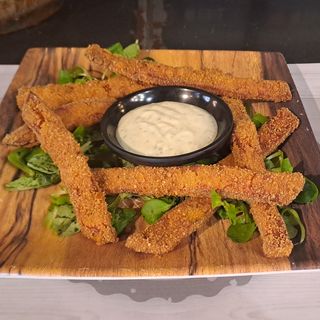 Bastoncini di mortadella IGP impanati