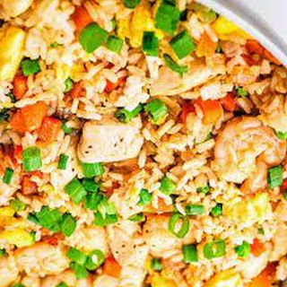 Stir fried rice, special gizzard, plaintain/coleslaw