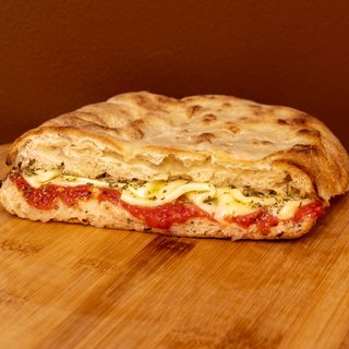 Schiaccia pizza (schiacciate toscane-cottura su pietra)