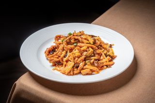 54. Maiale con verdure e piccante