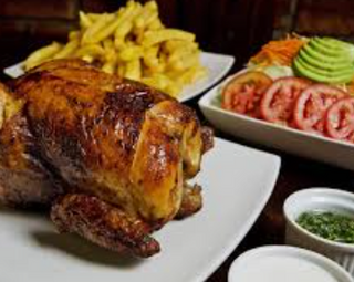 Pollo A La Brasa Entero Con Salsa Picante
