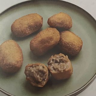 Croquetas de berenjena,queso de cabra y miel