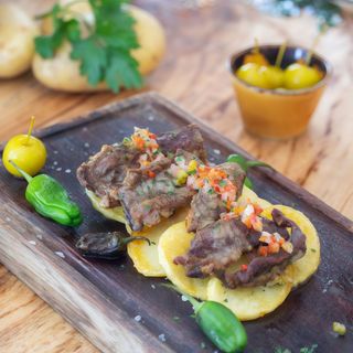 Lagarto de cerdo ibérico a la parrilla con chimichurri