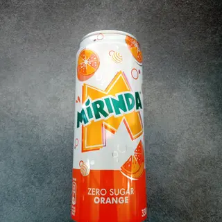 Напій Mirinda з/б 0,33л.